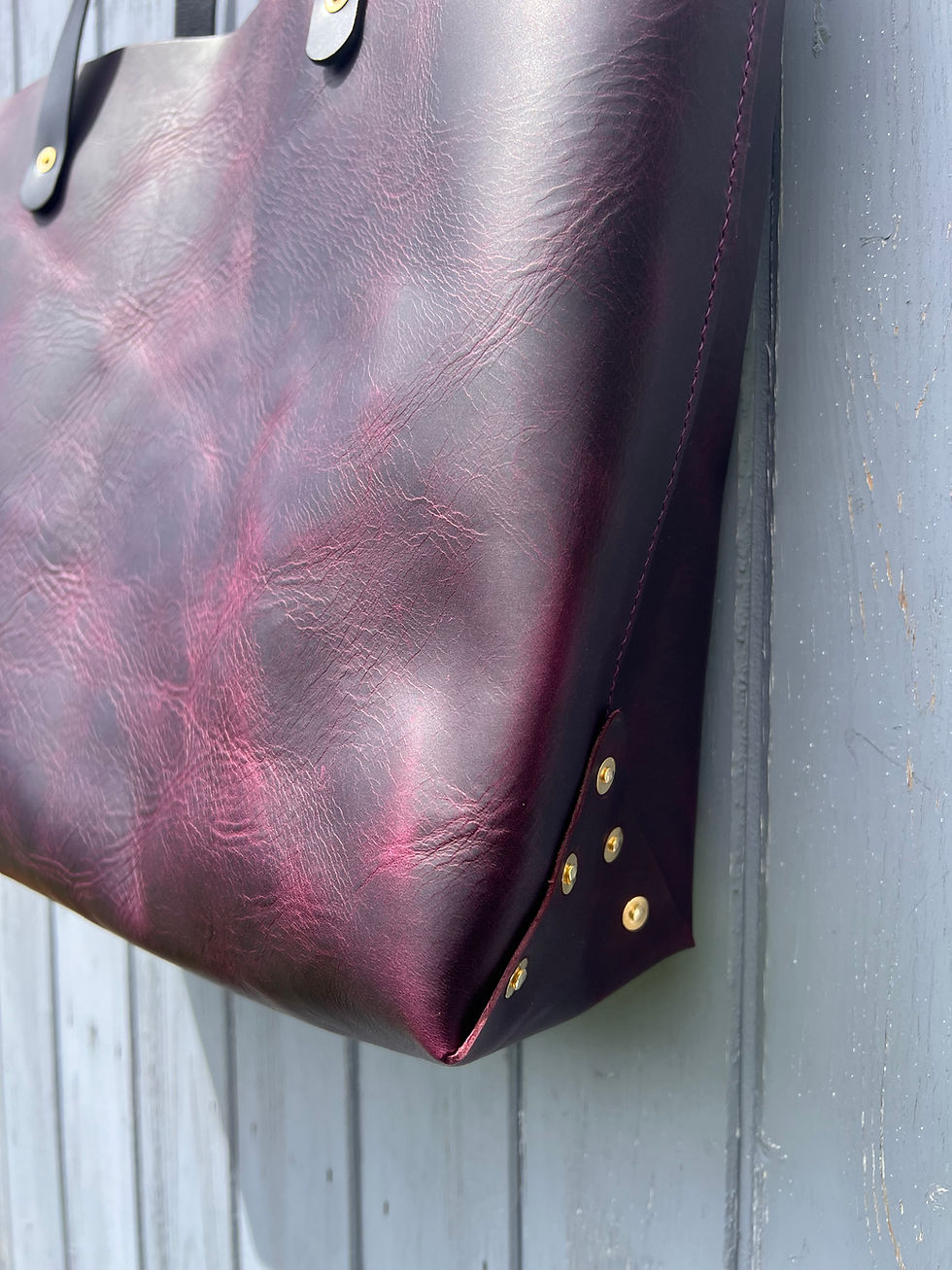 Thumbnail: Hand rivets on base of tote bag fold