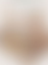 March Keepsakes patio mood board featuring a natural outdoor rug, white fringe patio umbrella, rattan outdoor pendants, teak dining table and chair, string lights, terracotta planters, and warm neutral color palette.