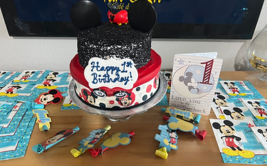 Mickey Mouse 1st birthday cake with 'Happy 1st Birthday!'