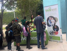 Organización local realiza evento de distribución de mochilas para el regreso a clases para preparar a los niños de Los Ángeles para el año escolar