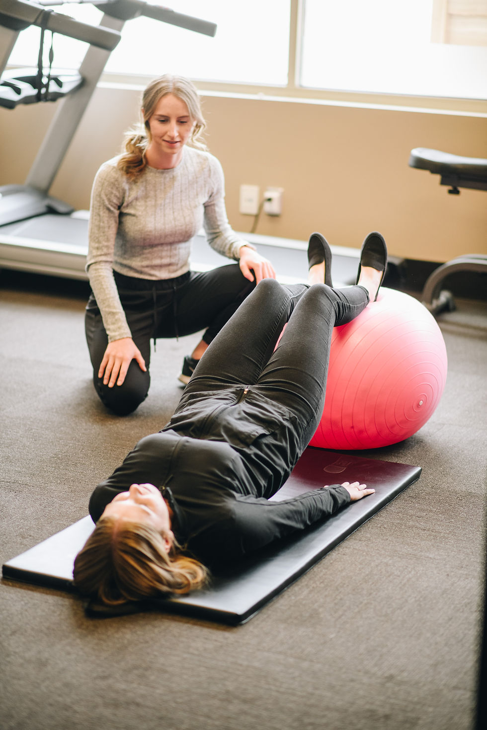Kinesiologist working with client