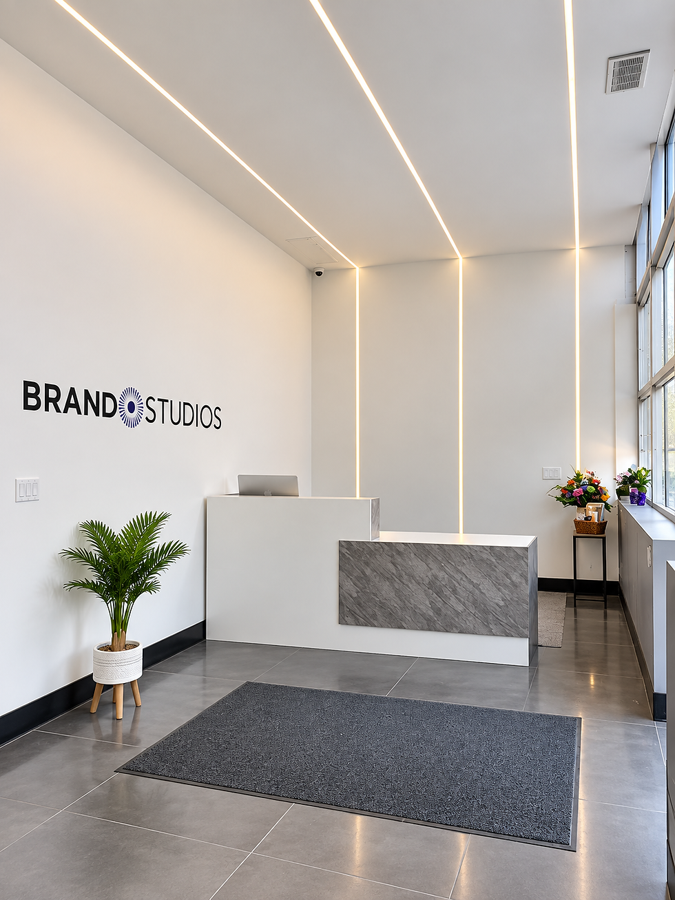 Modern reception area at a Burlington photo studio and private event space with custom lighting and front desk
