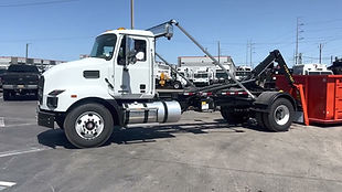 Roll-off dumpster placed on construction site for debris removal