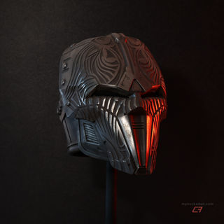 SWTOR Sith Acolyte two-part helmet, cold-cast in aluminum-infused resin for a realistic metallic look. Padded, and ready to wear. Bathed in red light. Front-right view.