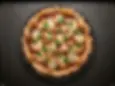 Halal BBQ Chicken Pizza from Chicago Pizza & Pasta in Irving. BBQ sauce, red onion, BBQ chicken