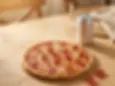 Halal small beef pepperoni pizza lunch with a canned soda from Chicago Pizza & Pasta in Irving