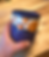 Hand-painted blue pottery mug from Suamico, WI gallery.