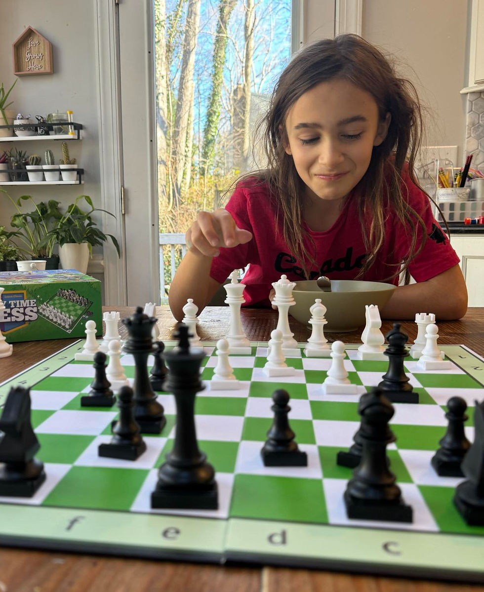 girl playing chess close up. 