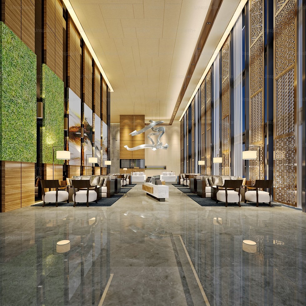 Elegant hotel lobby with high ceilings, modern seating, green wall panels, and reflective marble floors. Warm lighting creates a luxurious ambiance.
