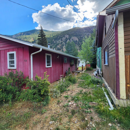 Red cabin, mountain view, Bighorndesignbuild