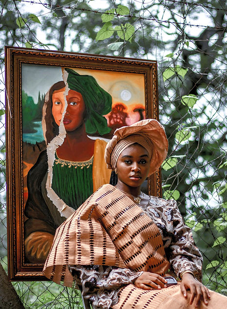 Woman with portait behind her