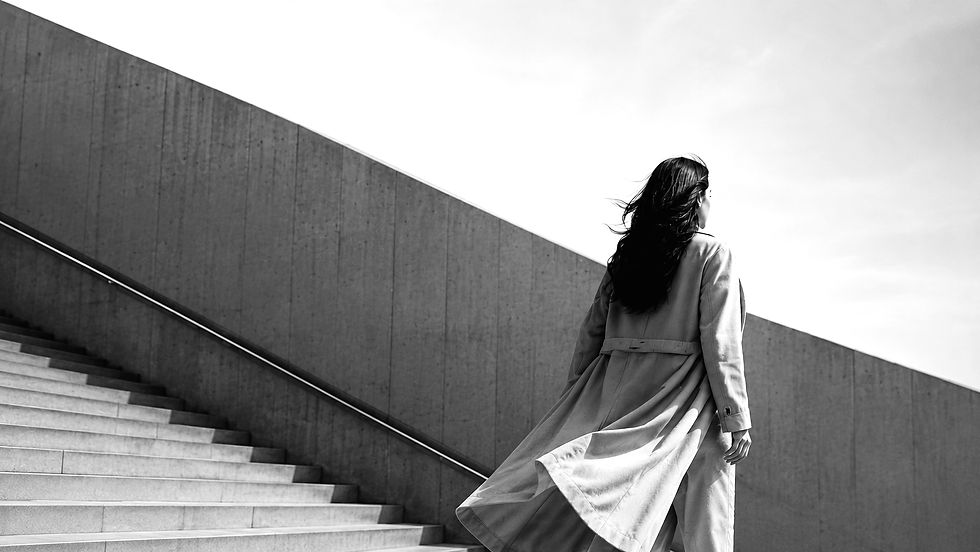 Woman gazing decisively at the horizon