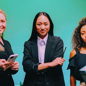 three confident business women