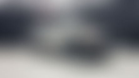 Close up view of 40mm thick multi layered glass clad polycarbonate bulletproof car window displaying cross section thickness used for B6 and B7 ballistic protection.