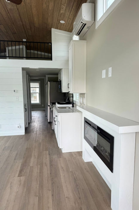 Clayton Coldwater kitchen and living room view from front door.