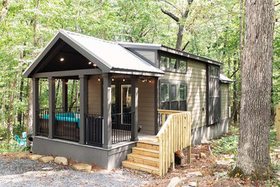 Exterior view of the Clayton Bankhead park model home with porch and siding.