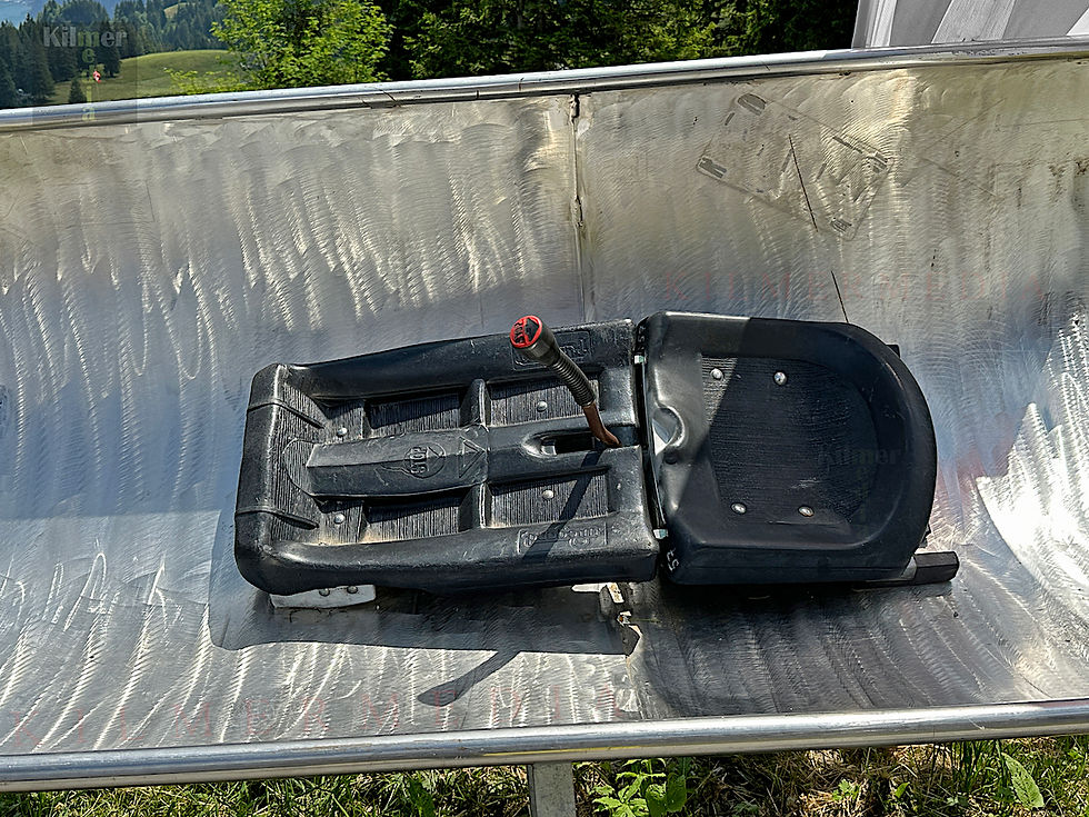 Alpine toboggan run cart on display - photo copyright by KilmerMedia, all rights reserved