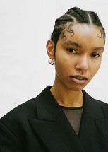 Woman with braids and  two silver earrings – Amanda Ljungkvist, stylist, All Blues