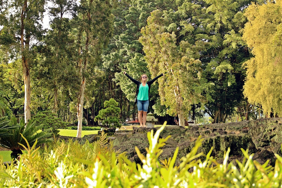 Kasey doing her best "top of the world" impression in the garden.