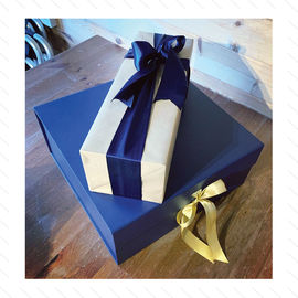 Gift wrapped present and box