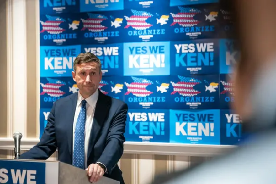 DNC Chair Ken Martin announcing the raised minimum funding for Democratic elections nationwide (Photograph: Allison Robbert for The New York Times)