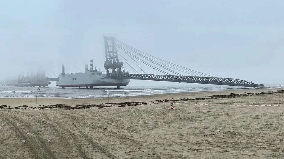 Pictures shared on Chinese social media appear to show a barge with a long connecting bridge, which analysts say could be used during an invasion of Taiwan