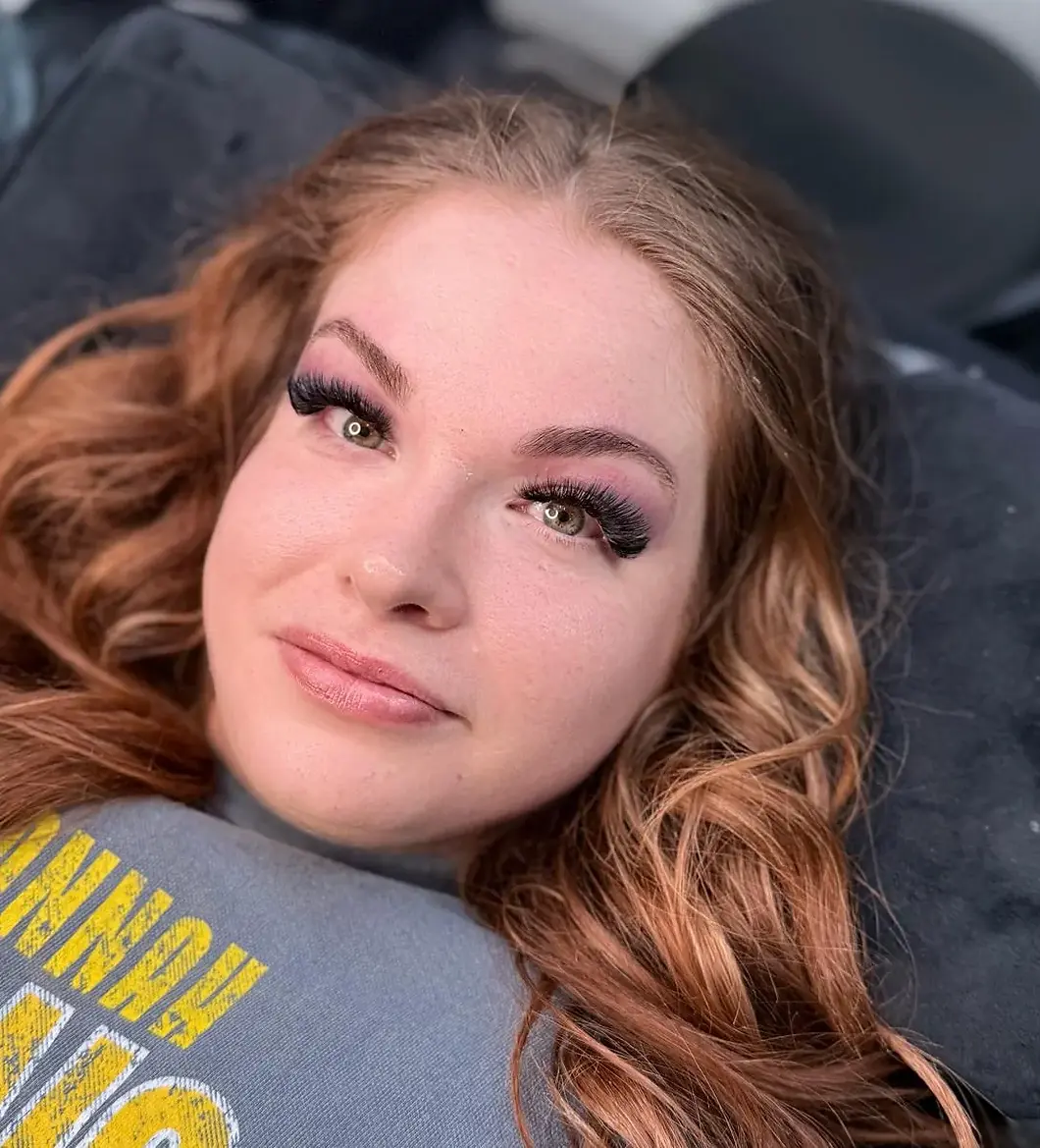 Close-up of a happy client who done eyelash extension at Cozy lash bar Kew salon.