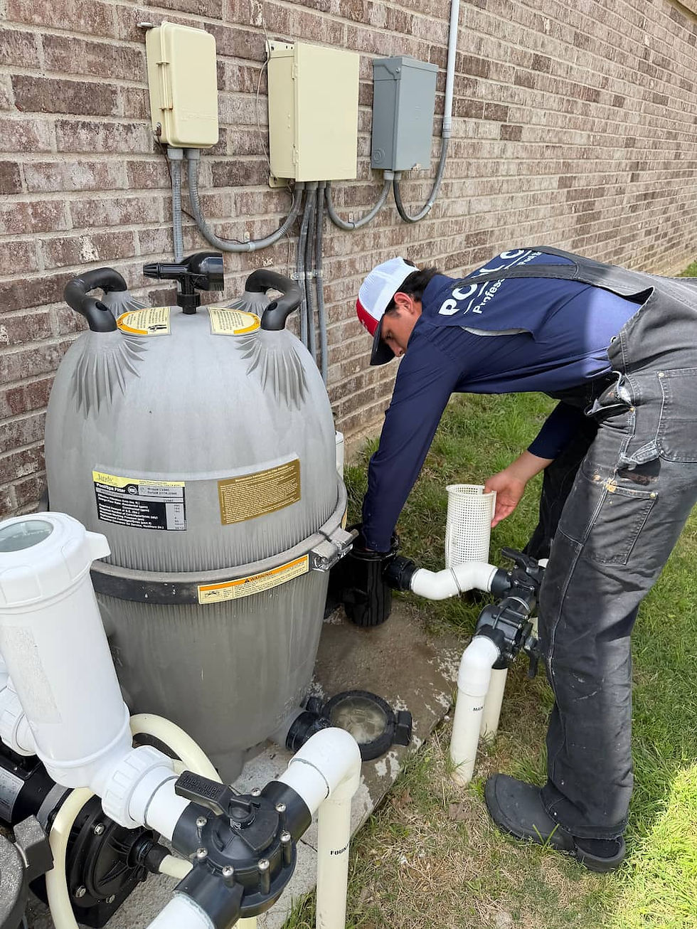 Pool co repairing a pool filter