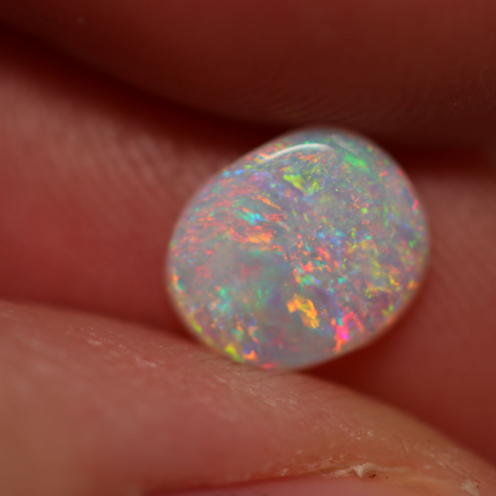 Thumbnail:  .57ct White Opal 8.0x7.0x1.7mm