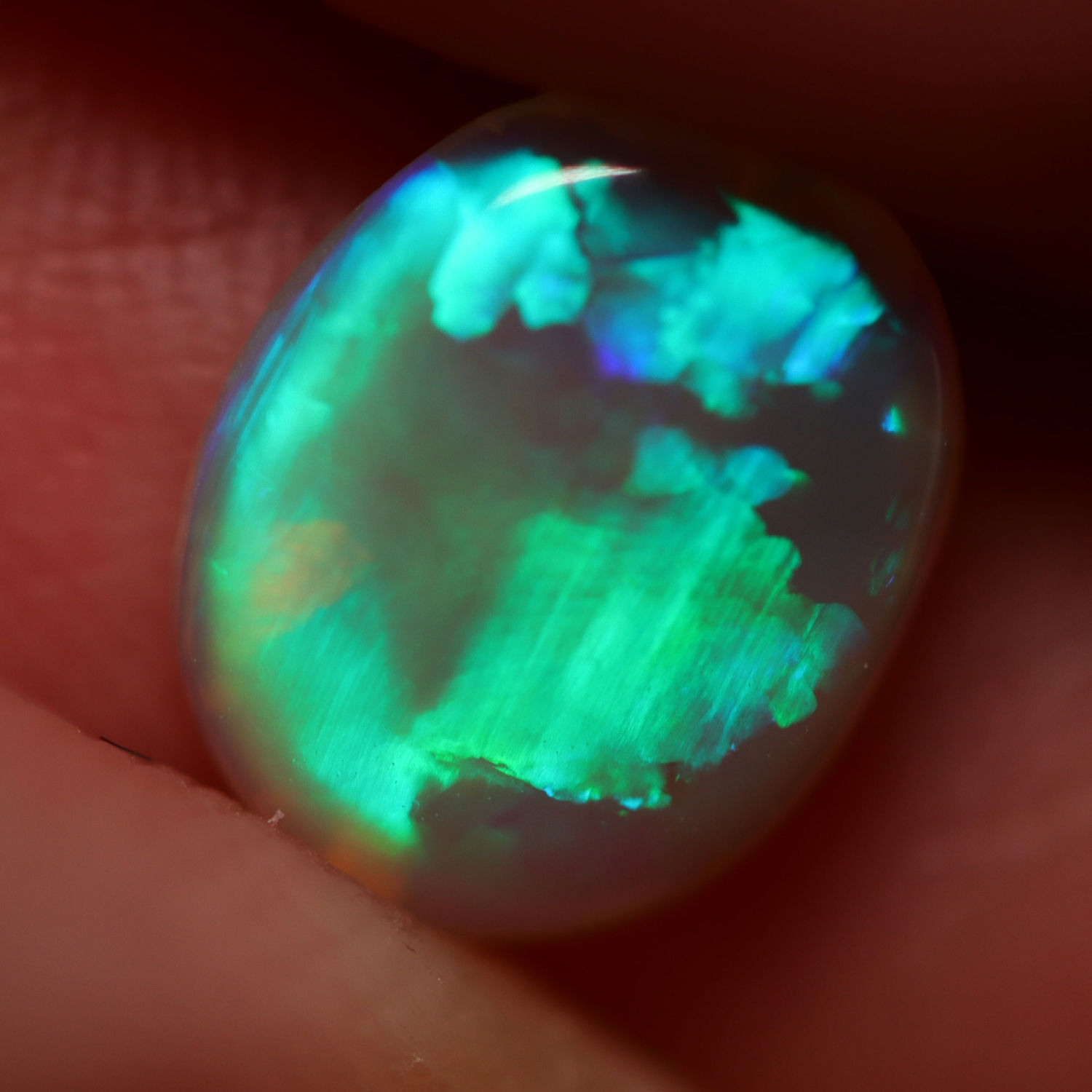 1.06ct Australian Dark Opal 9.0x7.3x2.2mm