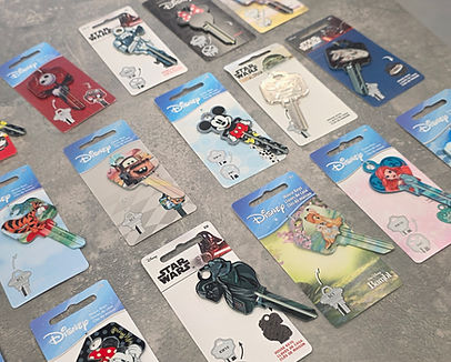 Character and sports-themed branded house keys for pop culture and media enthusiasts.