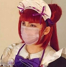 Maid Shinryou selfie. She is sitting holding tea. 
