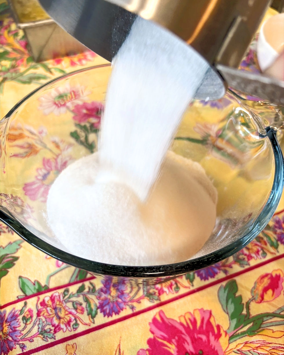 Combining flour and sugar. Picture of Blueberry Cobbler by Good Stuff by Missy