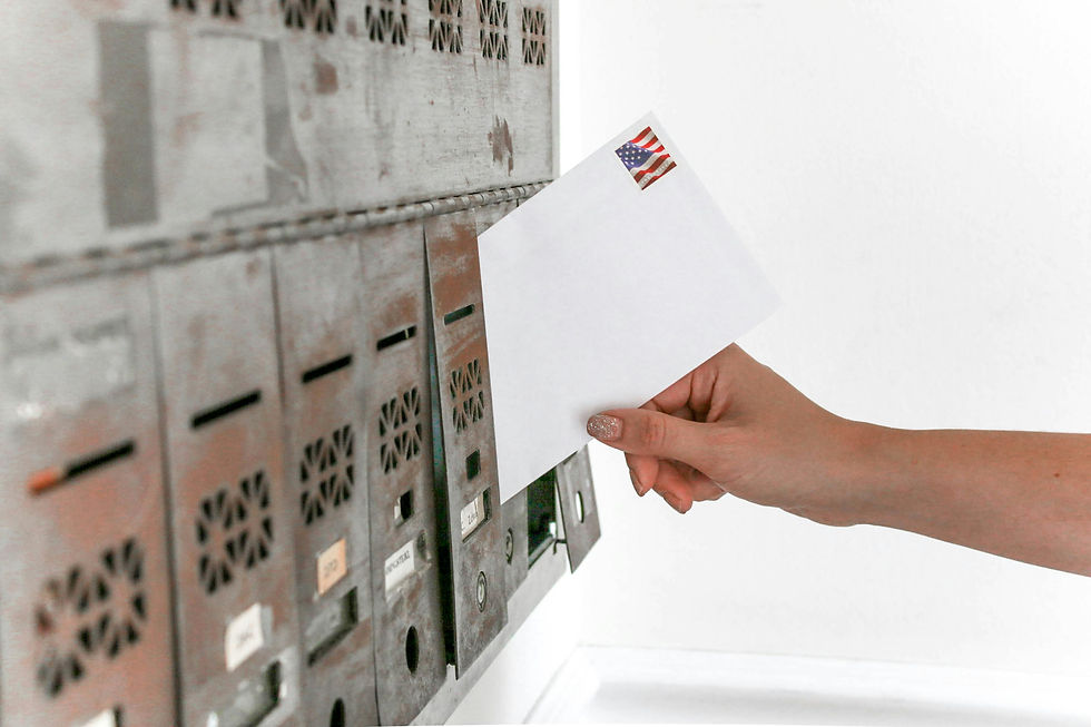 Woman's Hand Putting Letter In Mailbox | Medicaid Therapy Coverage | Women’s Mental Health Care | Accessible Therapy | Her Time Therapy