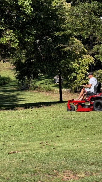 Shan cutting grass.jpg