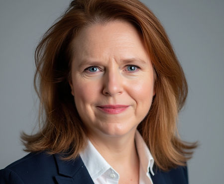 Megan Ramirez Headshot 4 (Blue)_edited_e