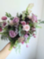 Moody Spring Bridal Bouquet with mauve and deep purple flowers. Designed by Pittsburgh Wedding Flori