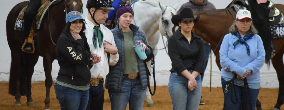 Volunteers and rider showing support