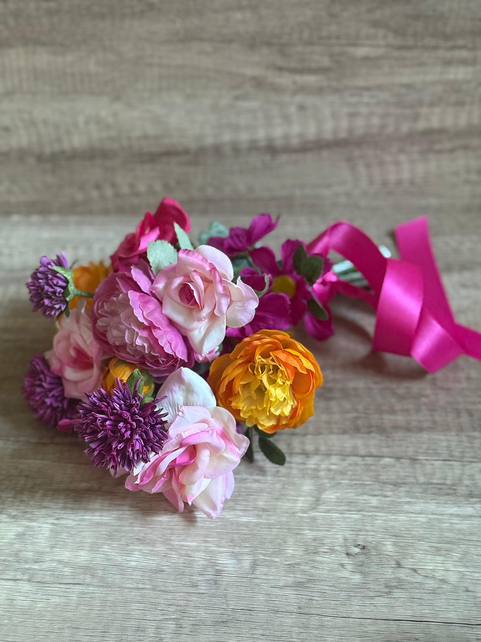 Thumbnail: pink and orange bouquet lying down