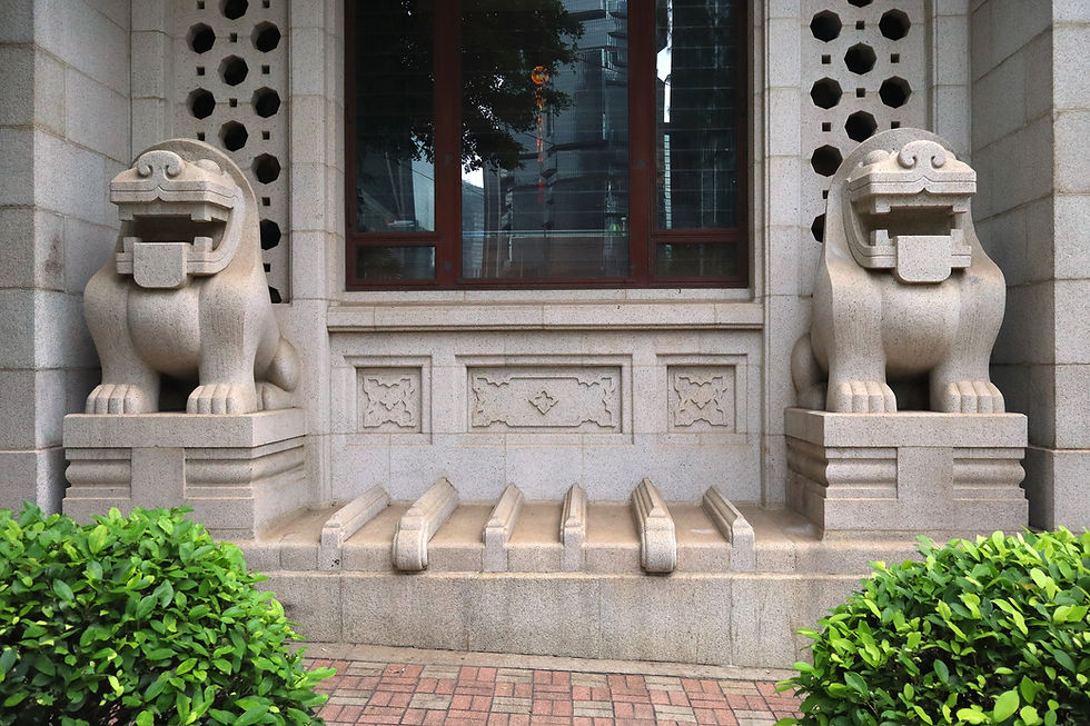 Art Deco Lions Standing Guard on the side of Bank of China Building