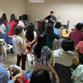 Pastor Ron from LA preaching as a guest speaker during the Sunday morning service.