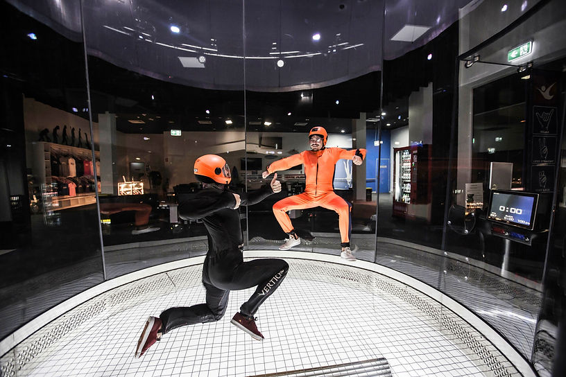 Indoor Skydiving - Man Sit Flying
