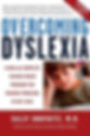 Book cover titled "Overcoming Dyslexia" by Sally Shaywitz, M.D., shows a boy looking thoughtful. Red and blue text with a white background.