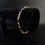 Thumbnail: Art Deco Style American 10K Yellow White Gold Chain Bracelet With Dark Sapphire