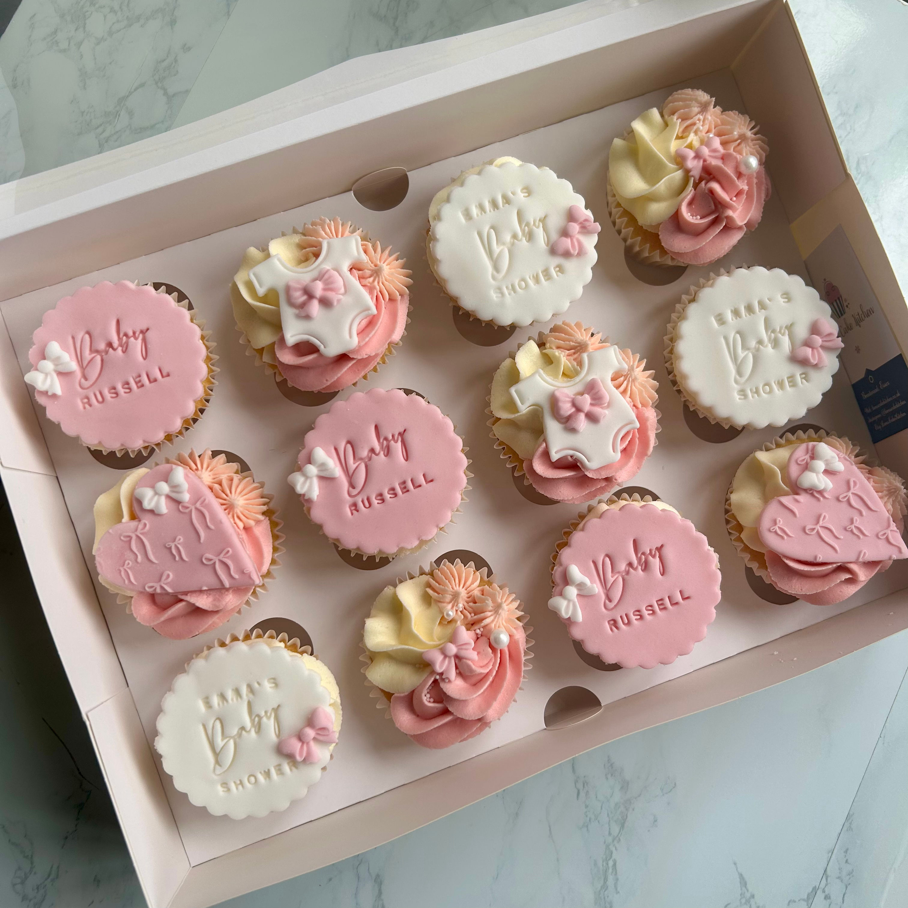 Bow themed baby shower cupcakes
