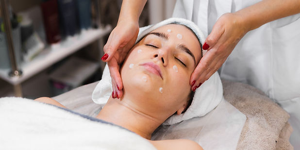 woman-client-salon-receiving-manual-facial-massage-from-beautician_edited_edited.jpg