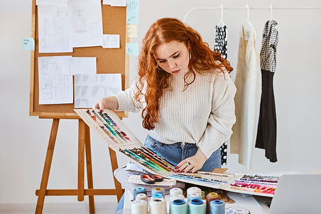 front-view-female-fashion-designer-working-with-color-palette-atelier.jpg
