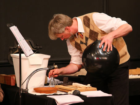 Ted Wenskus performing as a foley artist at fringe