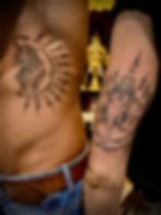 A matching set of a sacred tiger and Ganesha deity spiritual tattoo created by Ajarn Jee at Sak Yant bamboo Patong Phuket Ajarn Jee