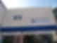 An insurance broker building in white and blue